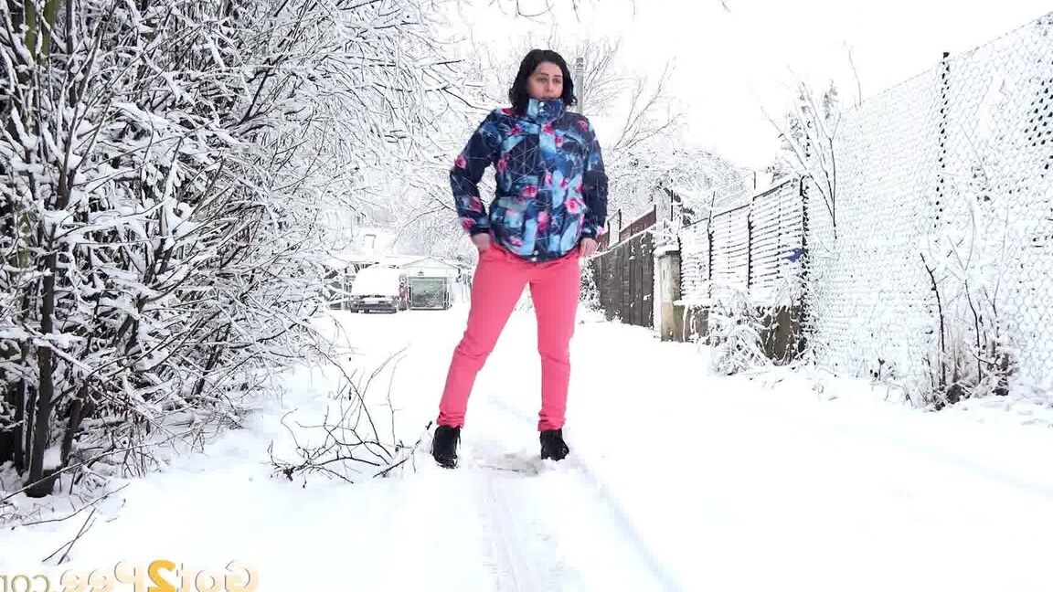 15P Gorgeous European babe squats to pee in the snow