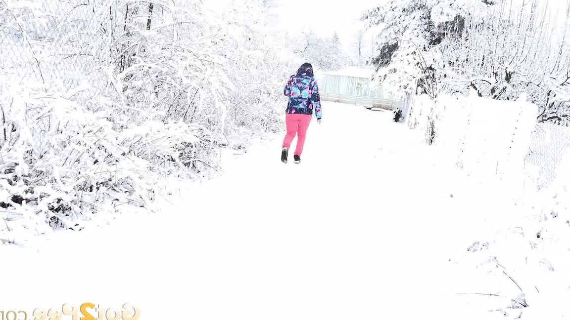 15P Gorgeous European babe squats to pee in the snow