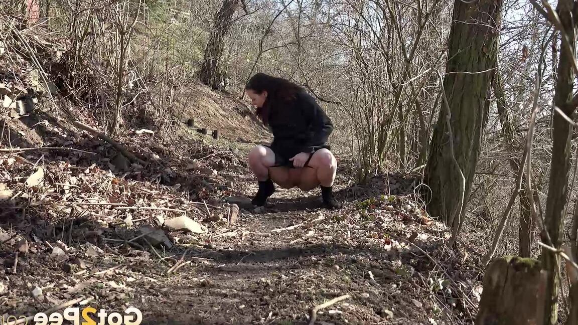 15P Amanda Hill squats to piss in the woodland