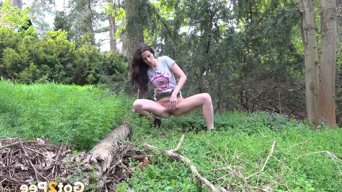 15P Ali Bordeaux squats to pee outside in the garden
