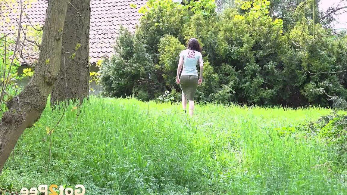 15P Ali Bordeaux squats to pee outside in the garden