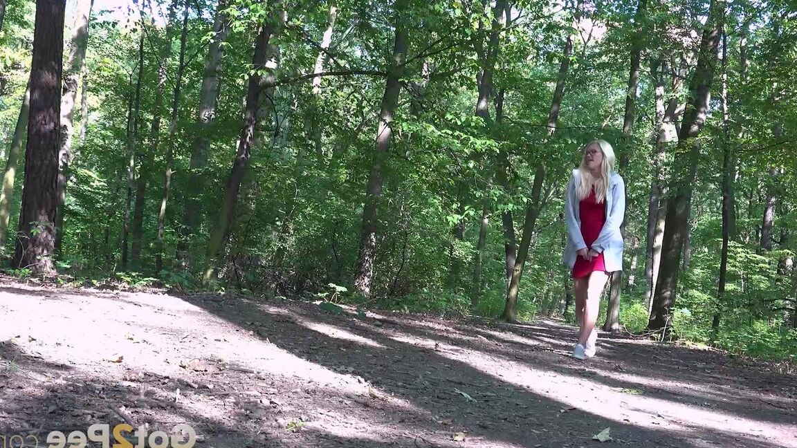 15P Stunning blonde Delphine relieves pee desperation