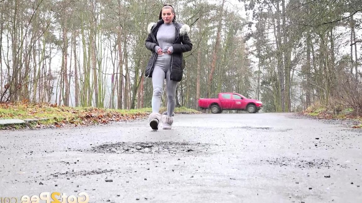 15P Victoria Daniels squats outside and pees