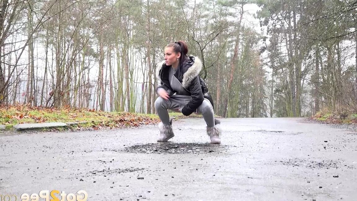 15P Victoria Daniels squats outside and pees