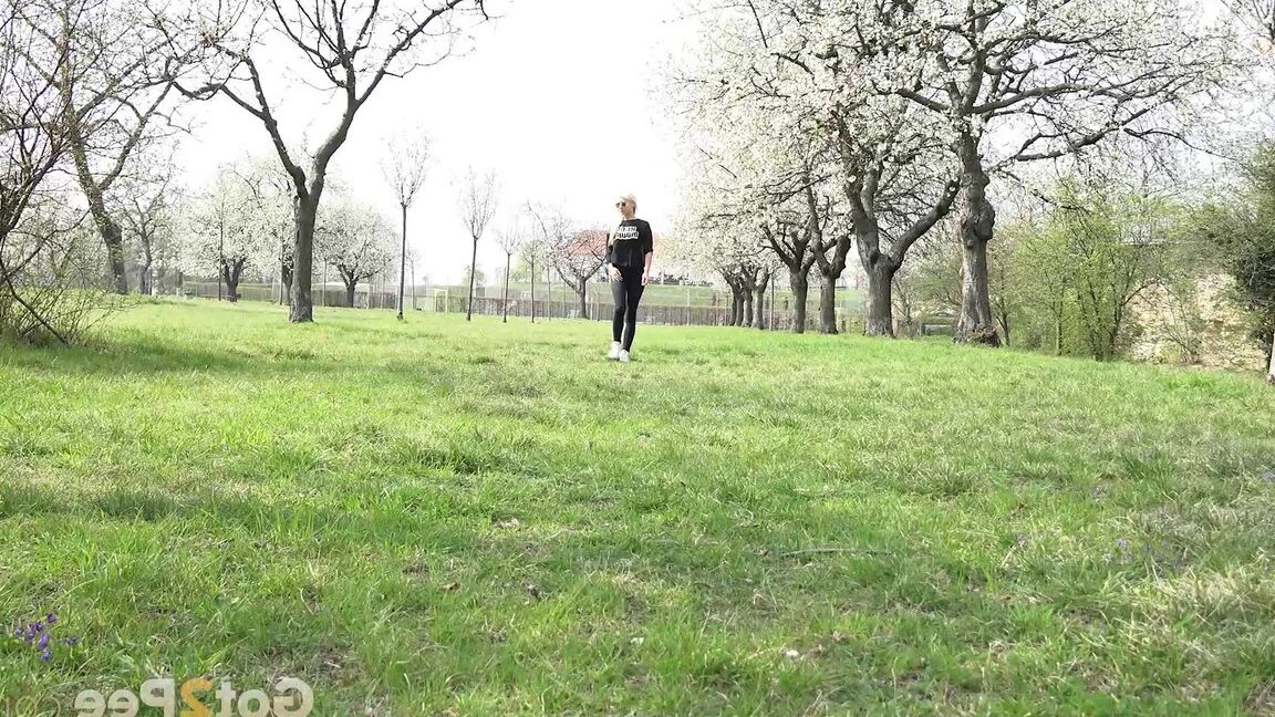15P Outdoor pissing in the suburbs for gorgeous blonde