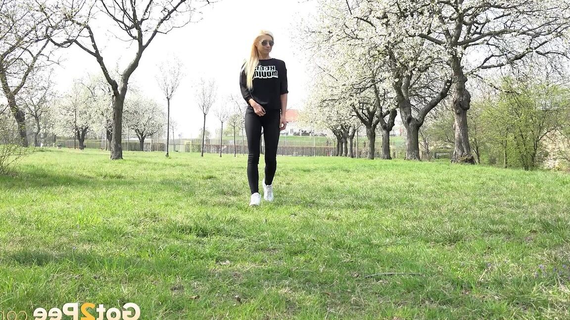 15P Outdoor pissing in the suburbs for gorgeous blonde