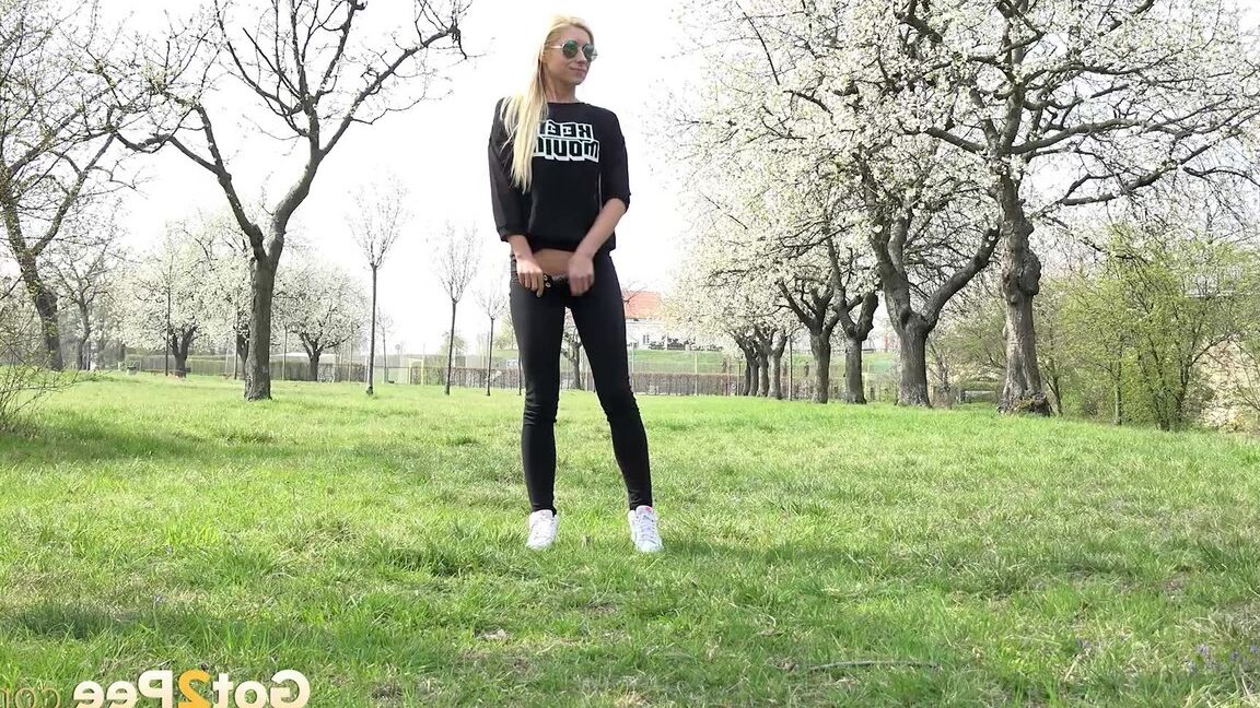 15P Outdoor pissing in the suburbs for gorgeous blonde
