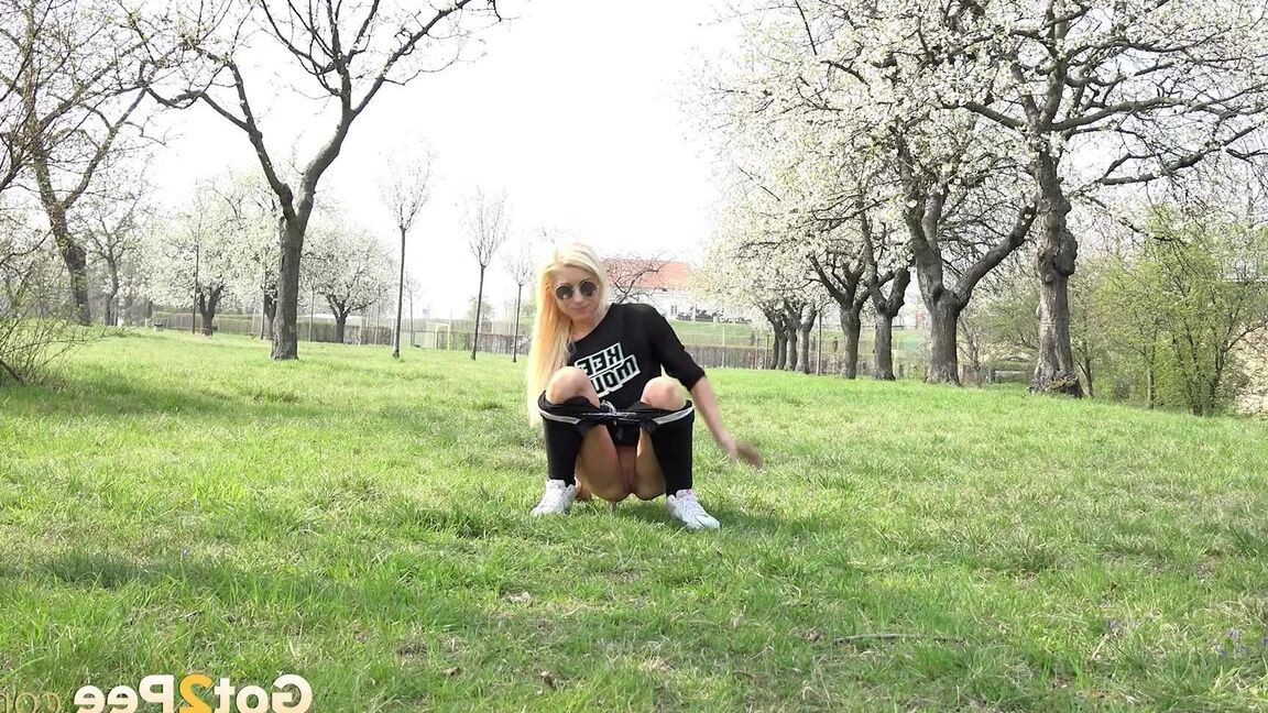 15P Outdoor pissing in the suburbs for gorgeous blonde