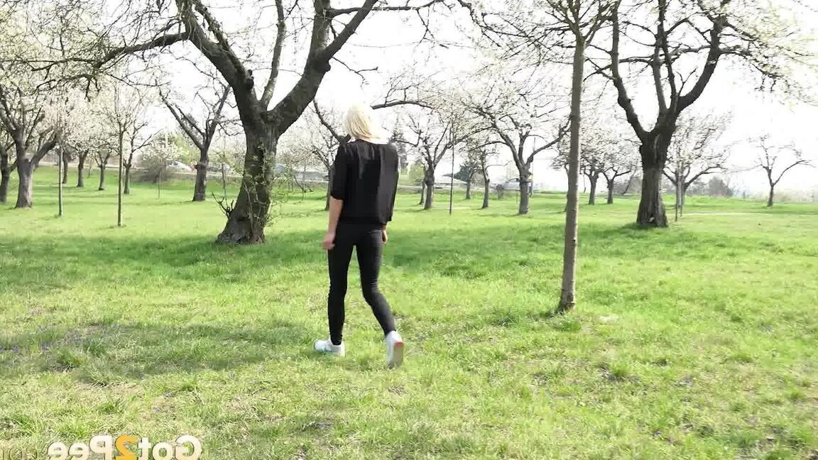 15P Outdoor pissing in the suburbs for gorgeous blonde