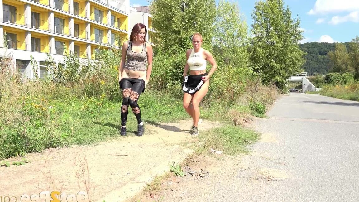 15P Hot lesbian joggers Vicky & Chrissy pause to squat for a pee on the path