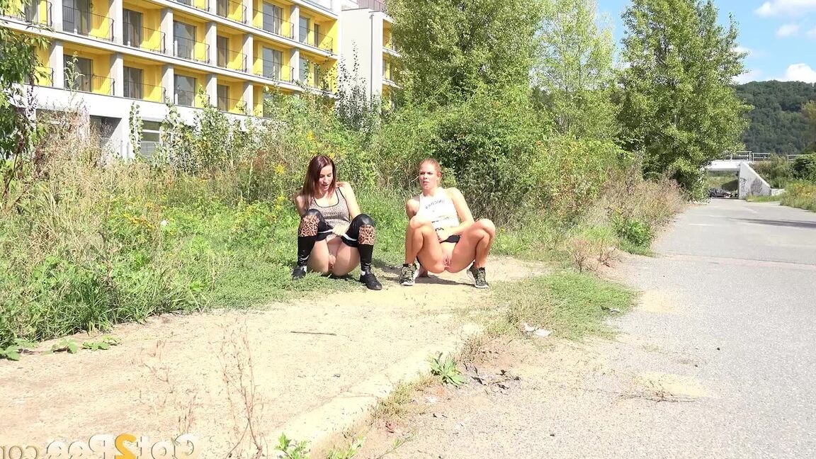 15P Hot lesbian joggers Vicky & Chrissy pause to squat for a pee on the path
