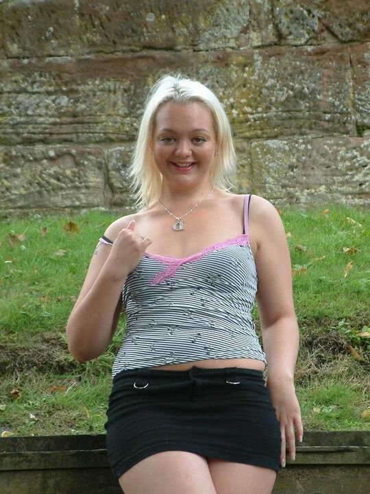 12P Blonde chick from the UK exposes herself in public with a view of a racetrack