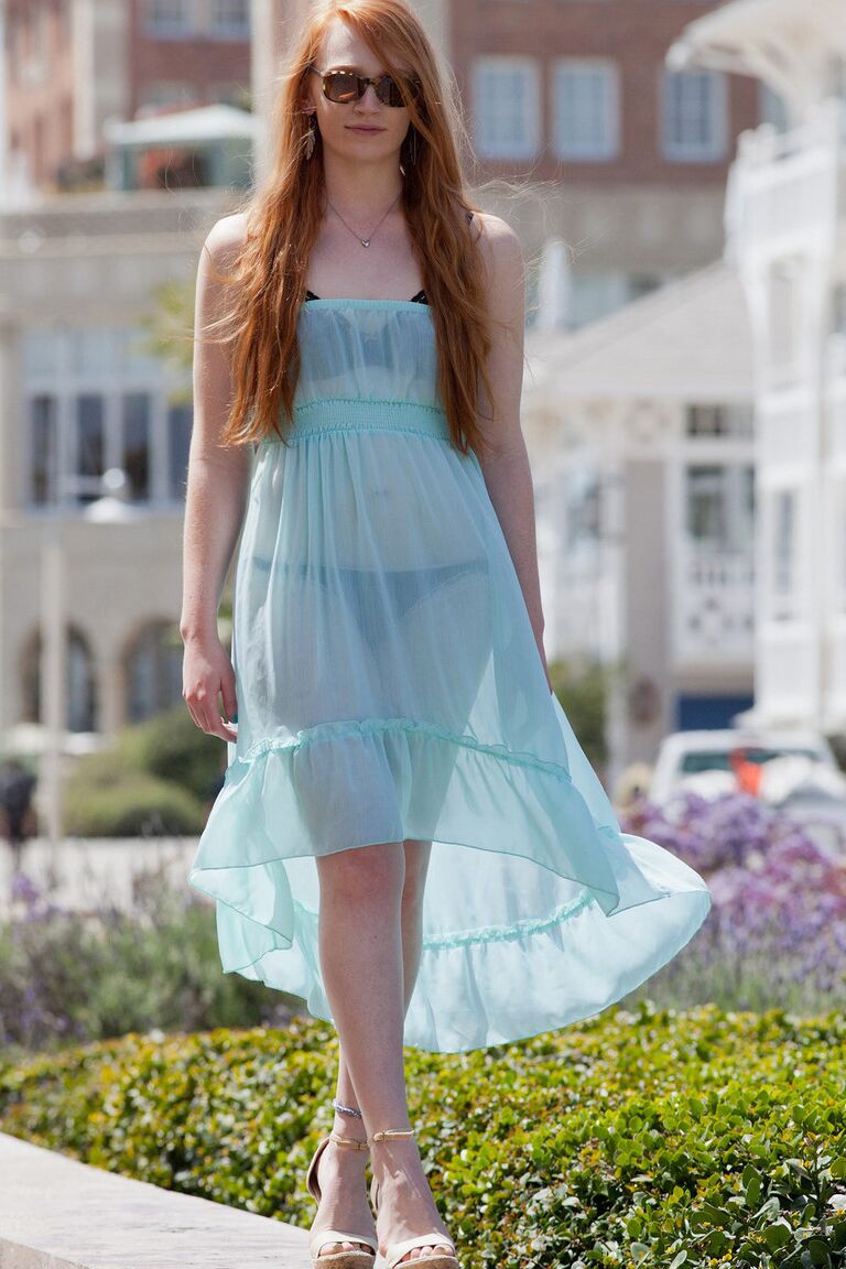 11P Redhead teen Bree Abernathy goes fr a walk outdoors in a see thru dress