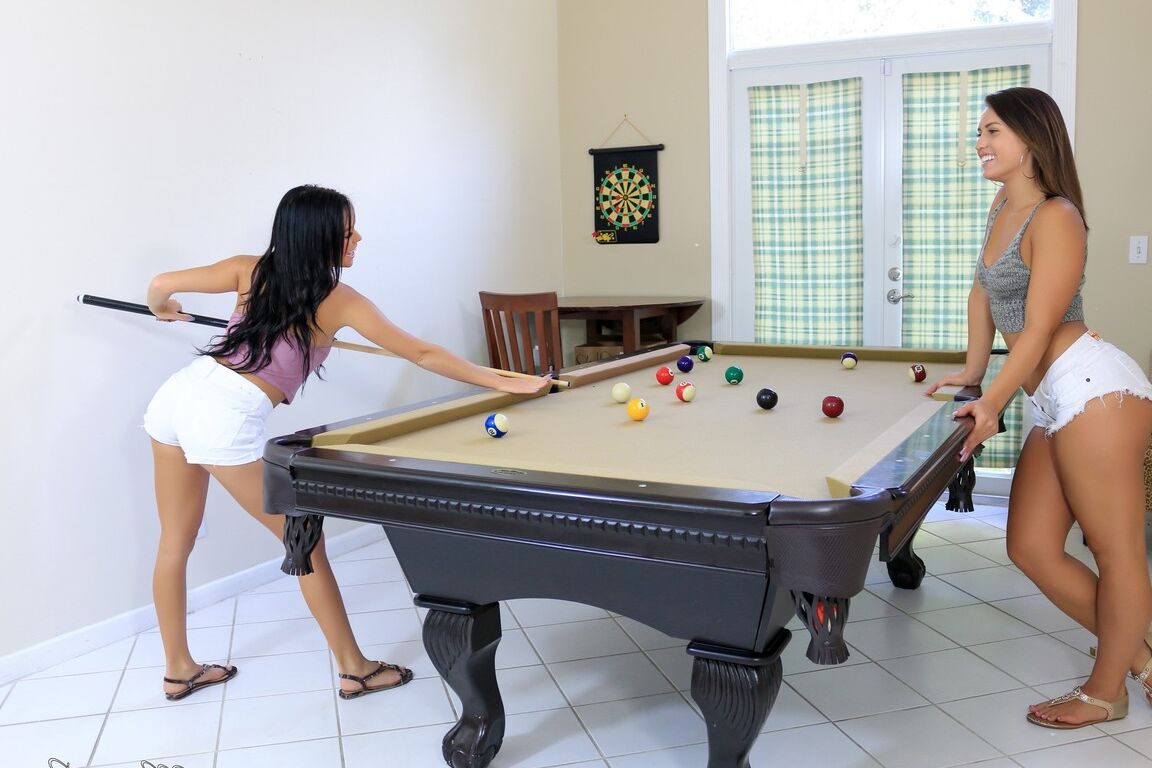 21P Petite Kelsi Monroe and Megan Rain suck each other's cunts on a billiard table