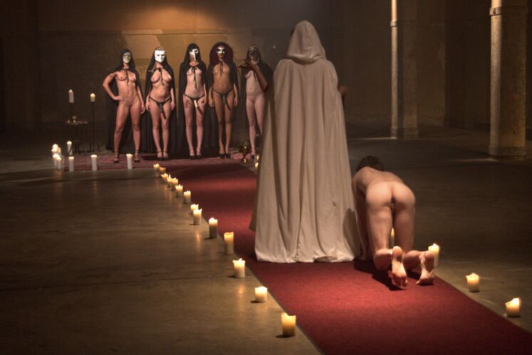 15P Kinky women peg a submissive man during the course of a dark ritual