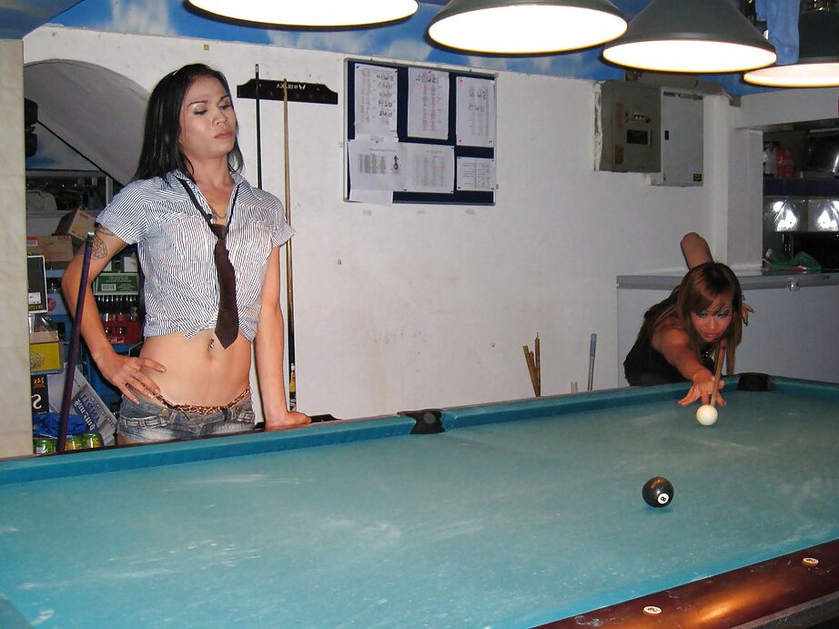 16P Gorgeous busty Asian tranny M bending over while playing pool