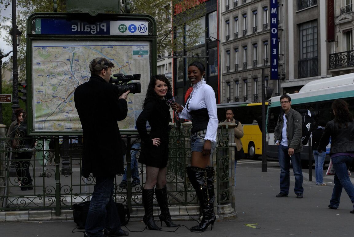 16P Brunette chick Penelope Tiger goes topless while being interviewed in Pigalle
