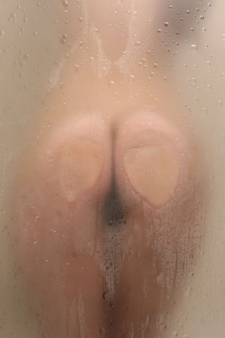 14P Babe with small boobs and amazing ass Cecelia flaunts her bush in the shower