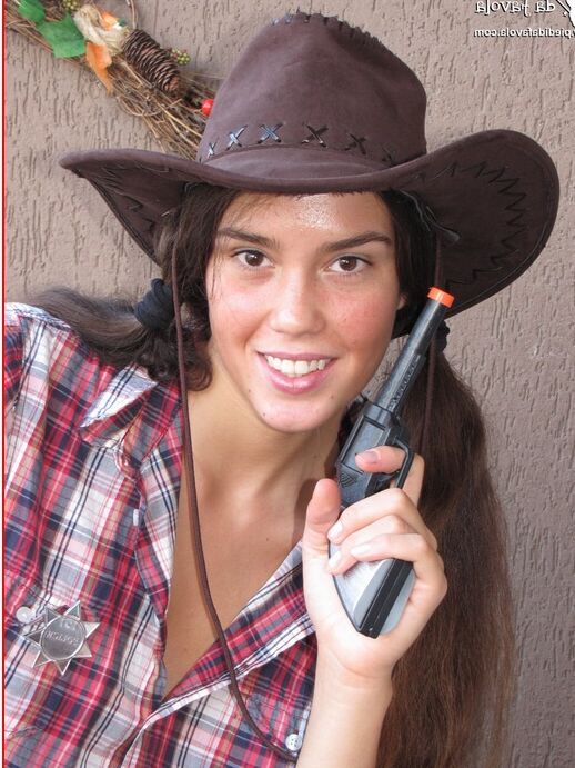 16P Amateur model Sweet Carla releases her hose covered feet from a pair of boots