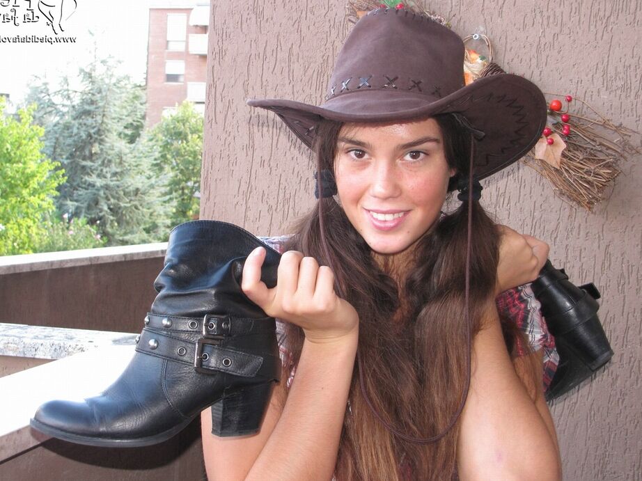 16P Amateur model Sweet Carla releases her hose covered feet from a pair of boots