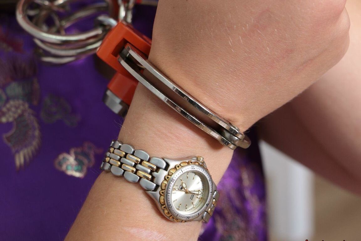 16P Short haired girl with piercings is restrained with cuffs wearing a kimono