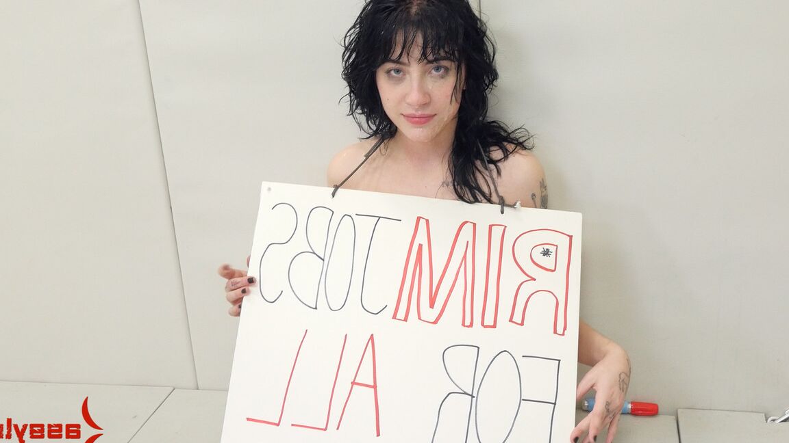 15P Brunette female Charlotte Sartre is released from solitary to perform rimjobs