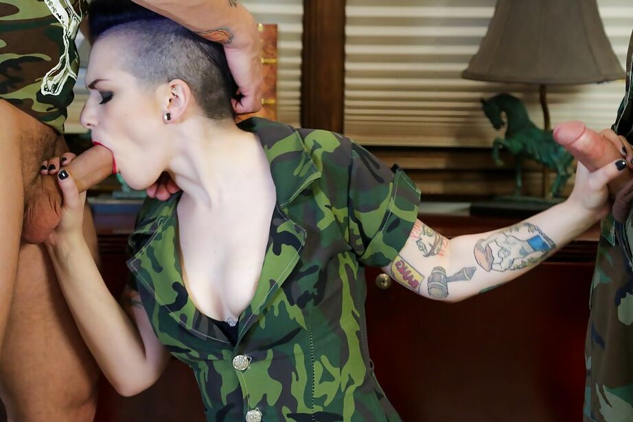 14P Punker Joanna Angel giving two blowjobs at once in military uniform