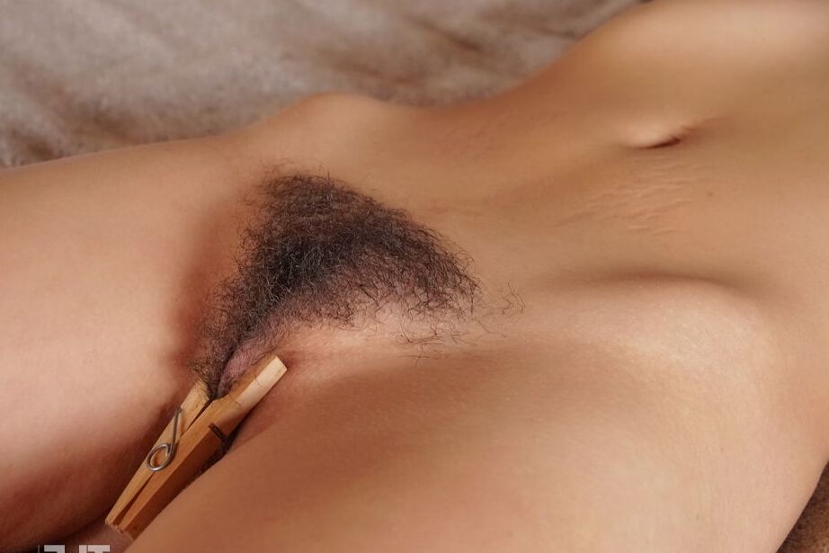 16P Kinky teen Daisy B plays with her hairy muff while practicing self bondage