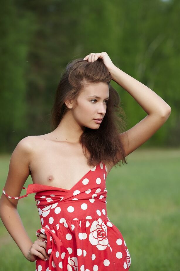 16P Skinny teen Afrodita gets totally naked in an expansive field of grass