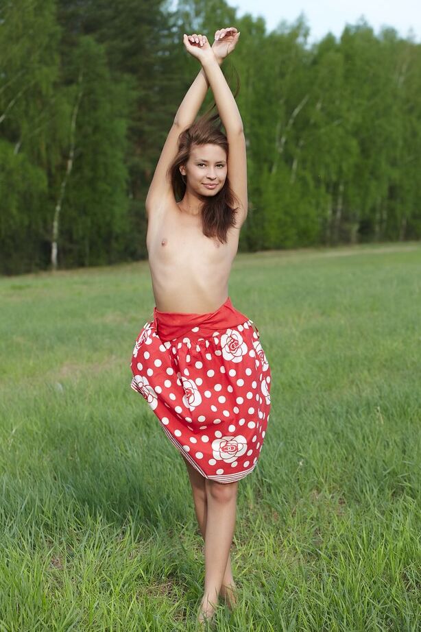 16P Skinny teen Afrodita gets totally naked in an expansive field of grass