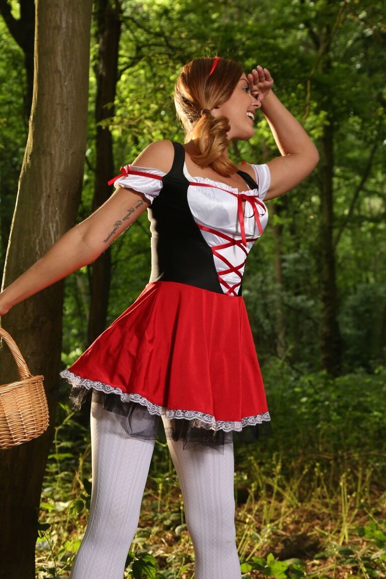 21P Sexy Little Red Riding Hood Gemma Jack teases in pantyhose in the forest