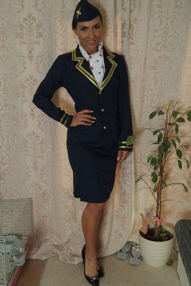 16P Flight attendant hitches up her skirt while struggling against handcuffs