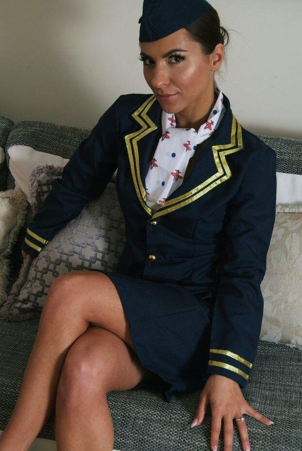 16P Flight attendant hitches up her skirt while struggling against handcuffs