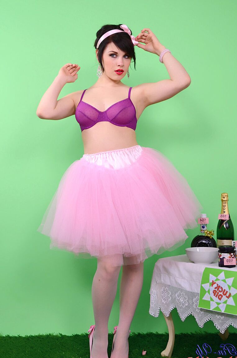 17P Pinup model Jocelyn-Kay lets her hair down before uncupping her nice breasts