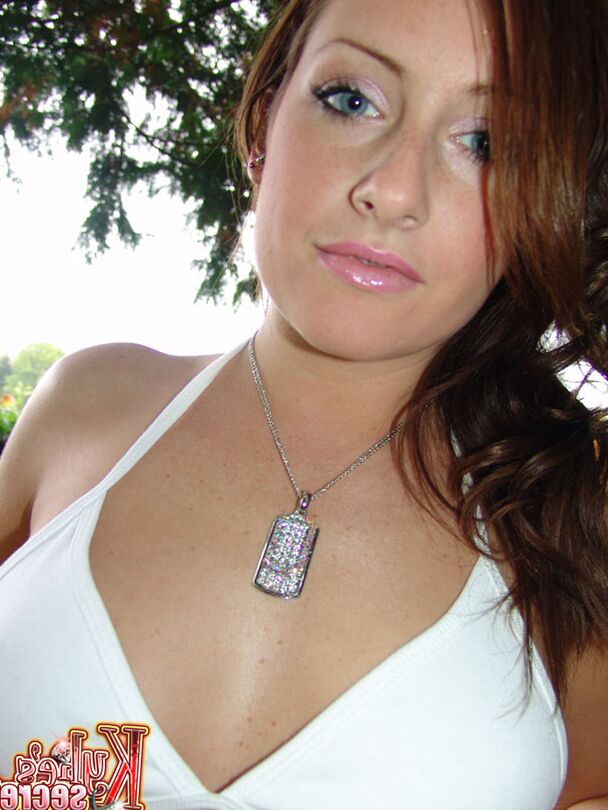 12P First timer Kylie shows her upskirt thong while covering her tits under a tree