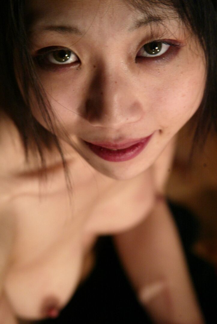 21P Submissive Japanese gets involved in kinky candle wax play while tied up