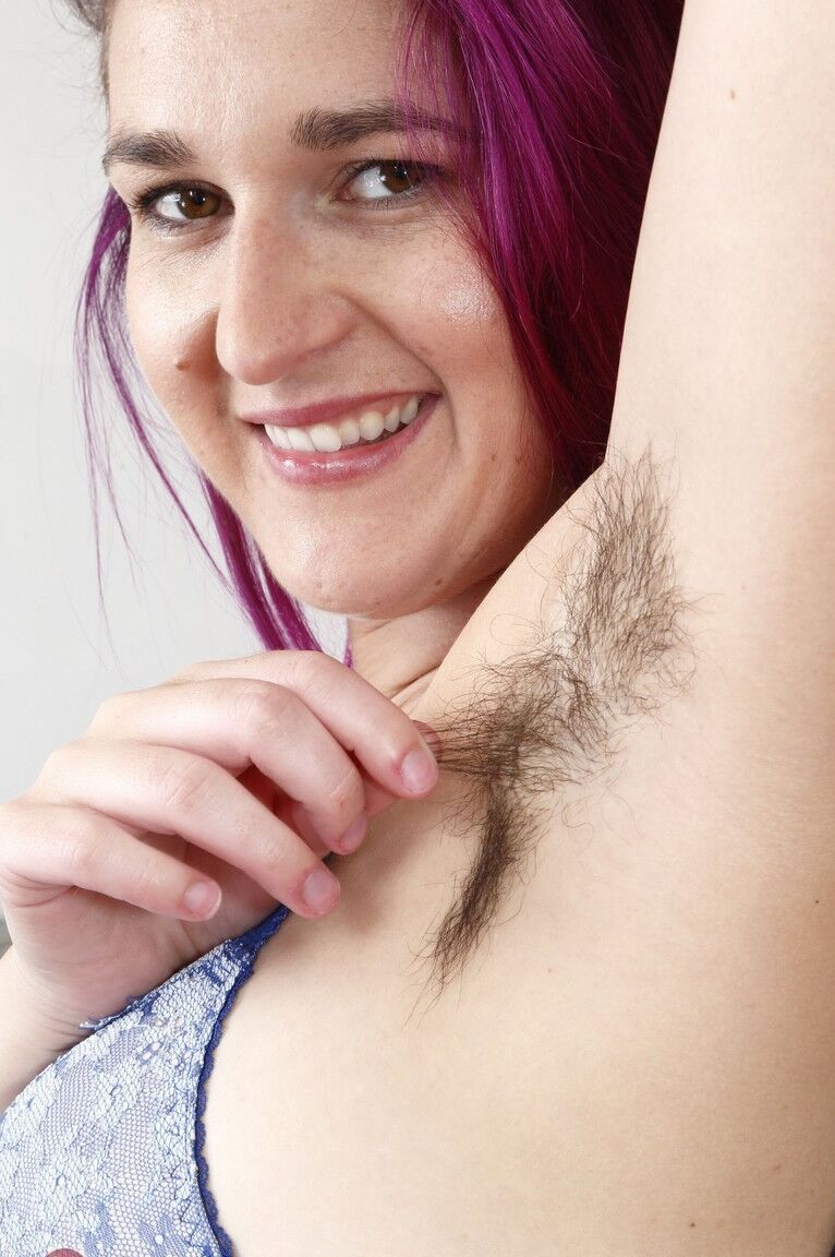 18P Purple-haired bitch KoKo Kitty proudly flashes hairy armpits and bushy crotch