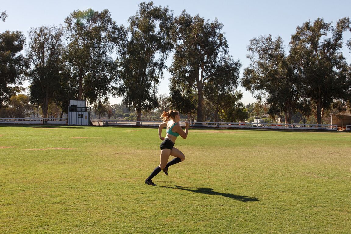 12P Ginger soccer player Deirdre Collins flashes her booty after the practice