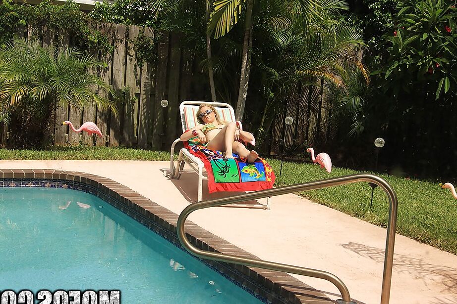 16P Pretty amateur babe Madison Chandler stripping by the pool