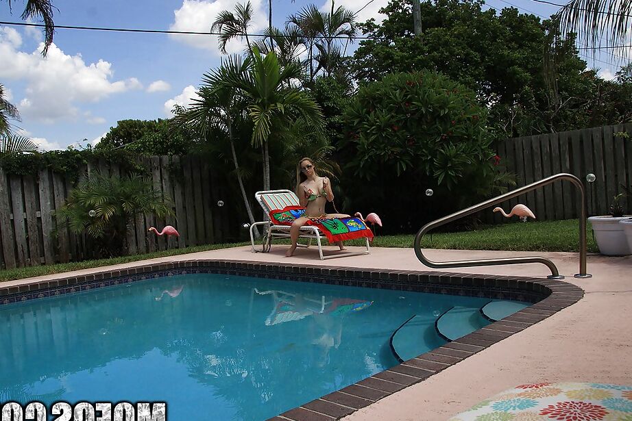 16P Pretty amateur babe Madison Chandler stripping by the pool
