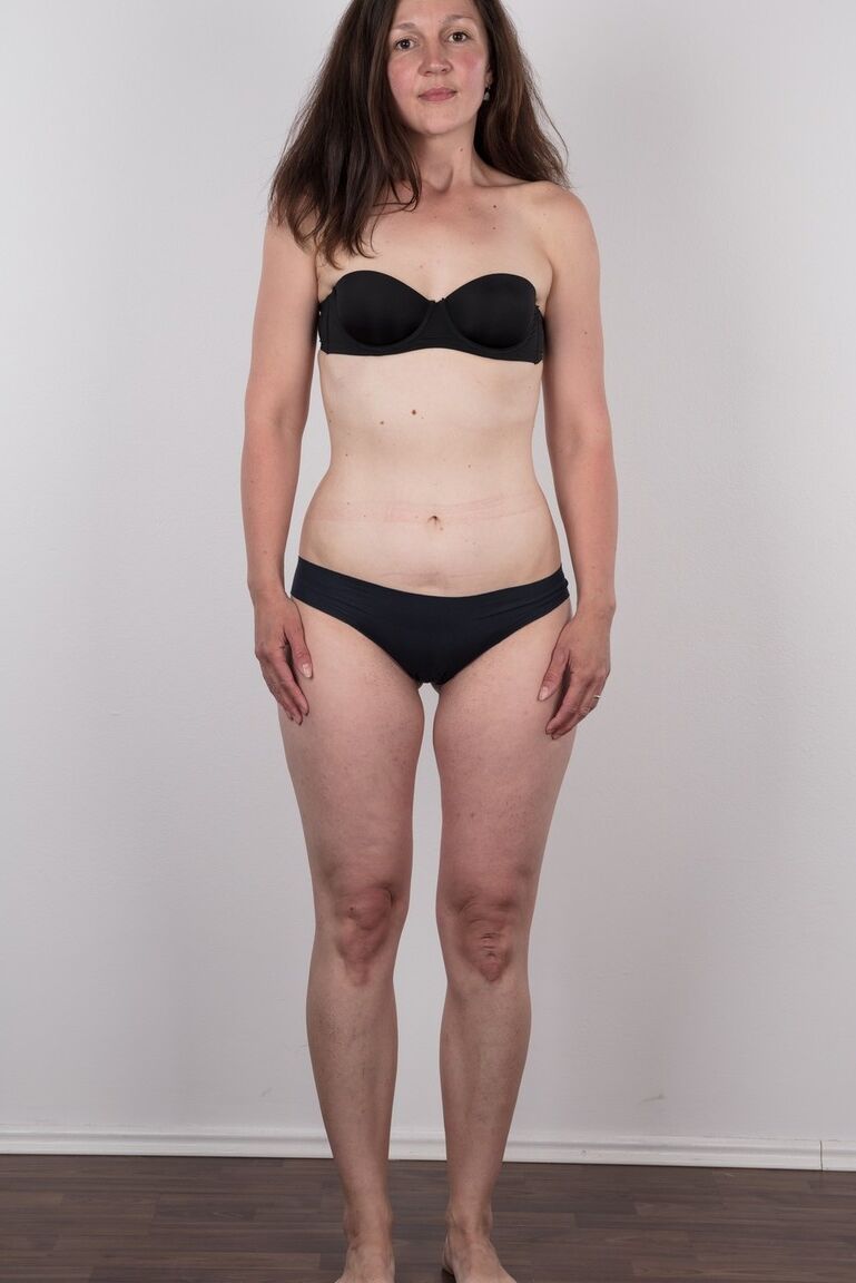19P First timer Petra holds her face firm as she takes off her clothes