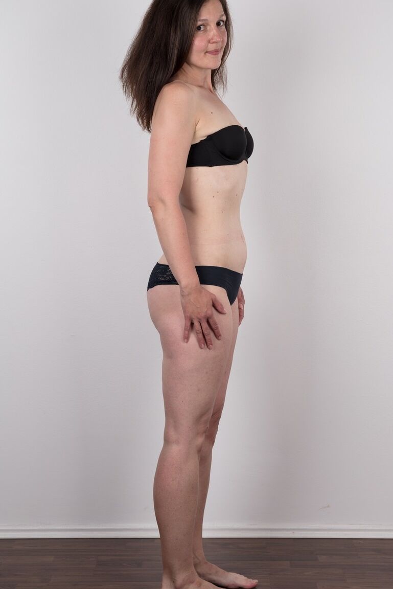 19P First timer Petra holds her face firm as she takes off her clothes