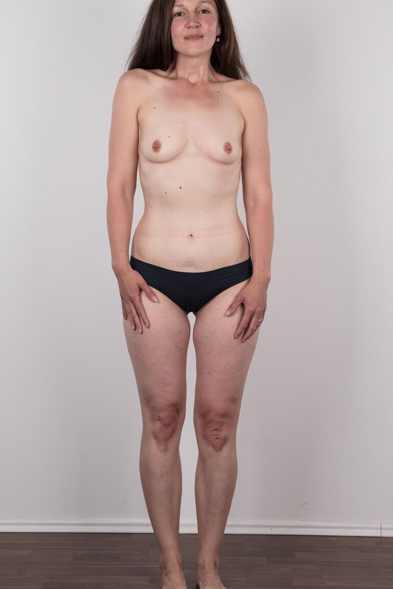 19P First timer Petra holds her face firm as she takes off her clothes