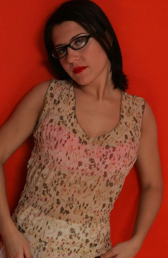 15P Brunette amateur sports red lips and glasses while exposing herself in nylons