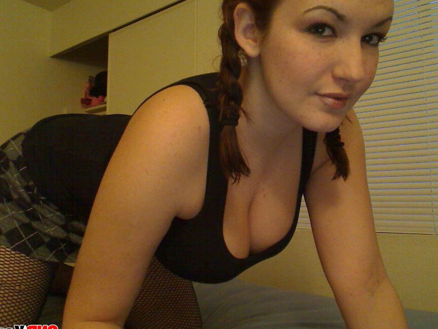 12P Kayla pulls down her top to show off her massive perky tits