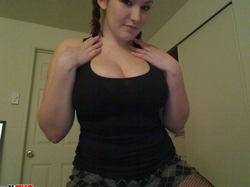12P Kayla pulls down her top to show off her massive perky tits