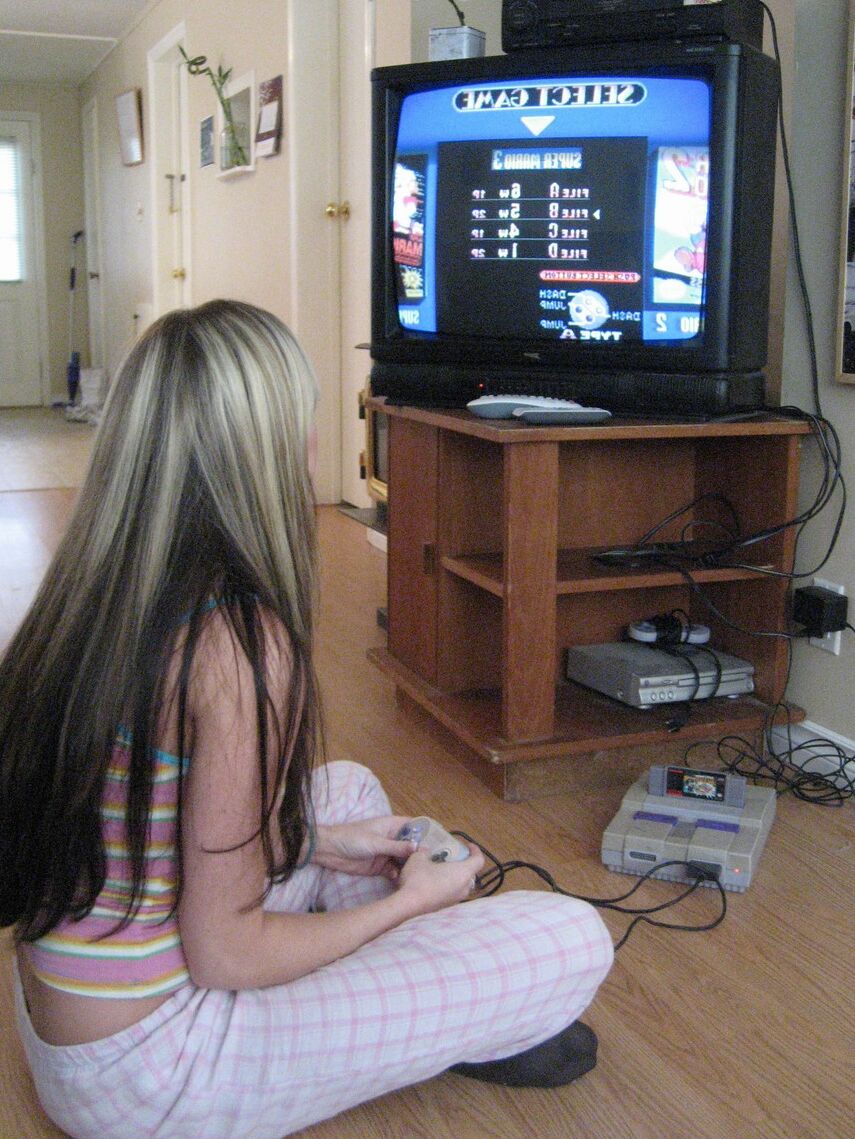 12P Watch as Cali strips while playing video games