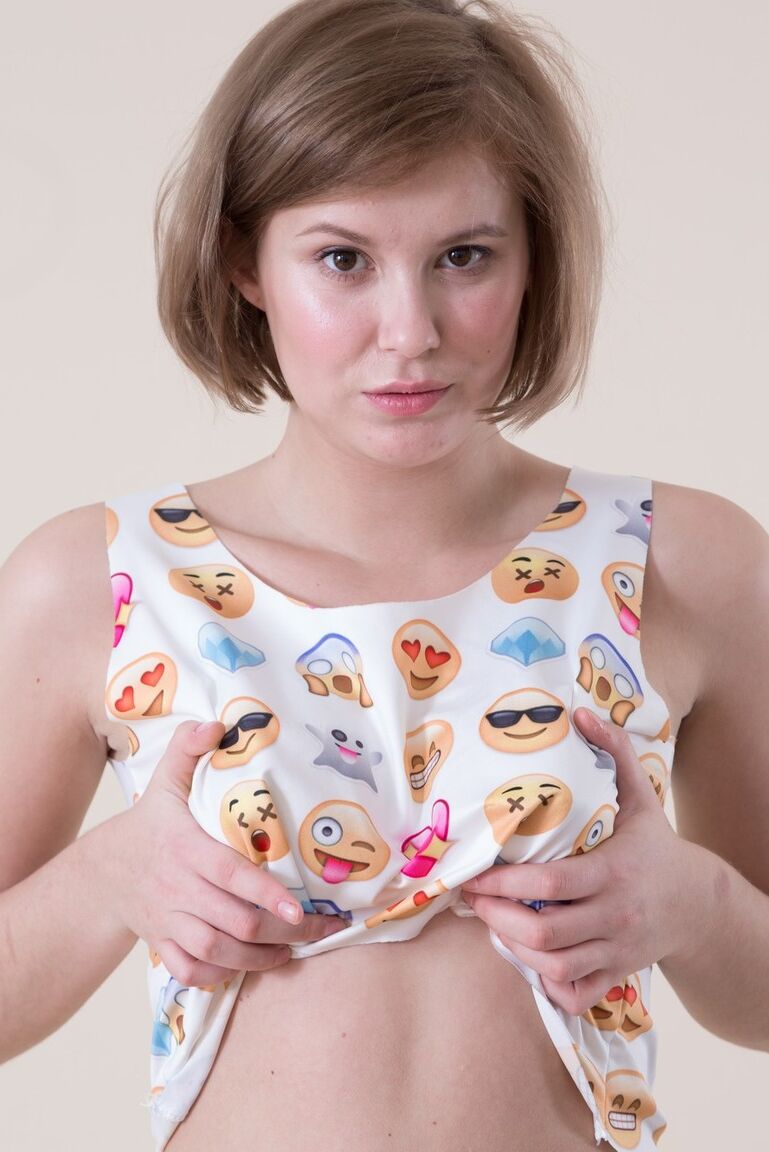 16P Nervous first timer Elza Mia sheds emoji dress and knee socks to model naked