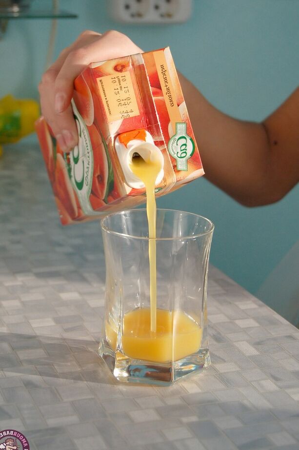 16P Dark-haired girl Hillary strips to white stockings over a glass of OJ