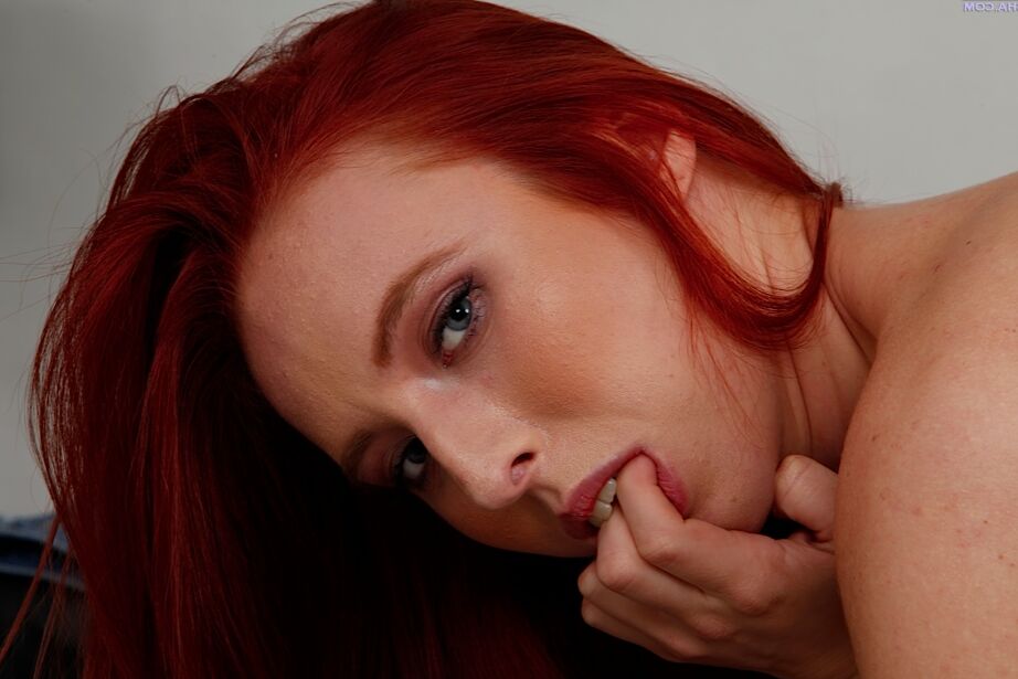 16P Cute redhead Sofie Carter pulls down pink panties to expose shaved pussy